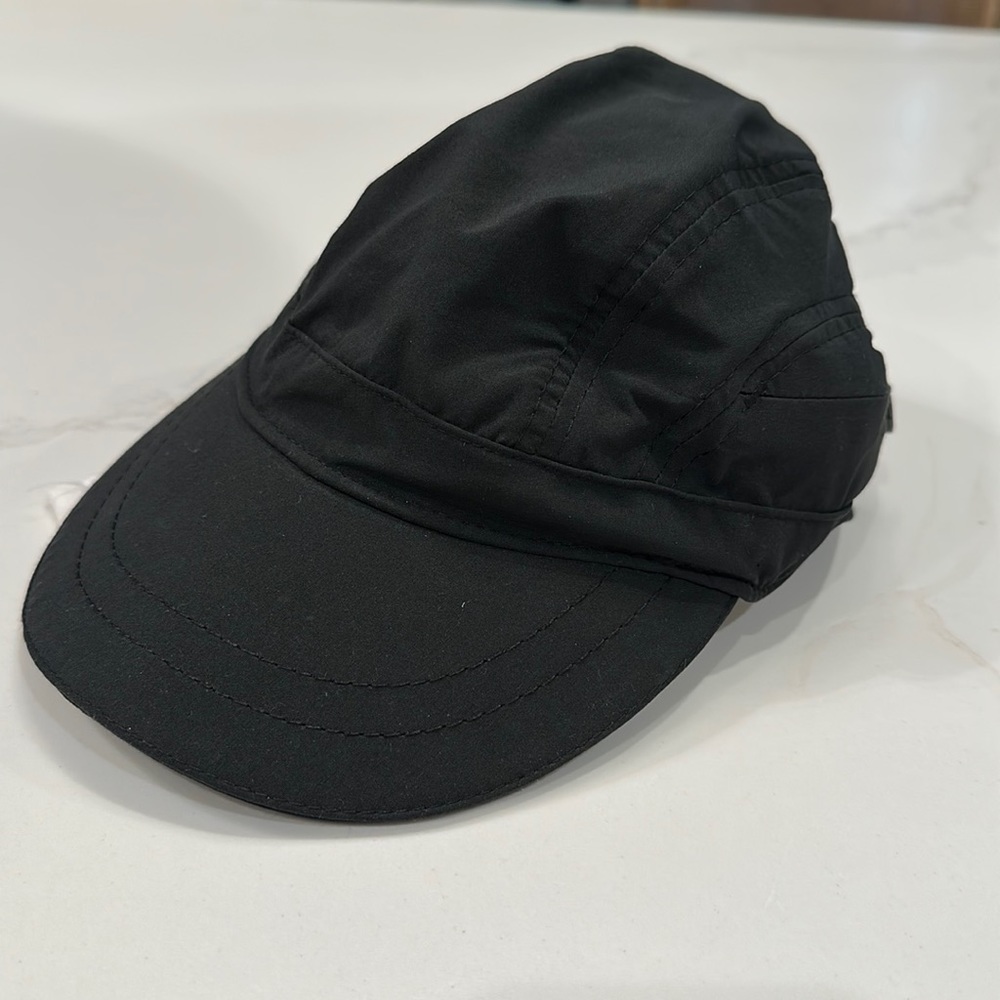 Lululemon cap with zipper pocket.